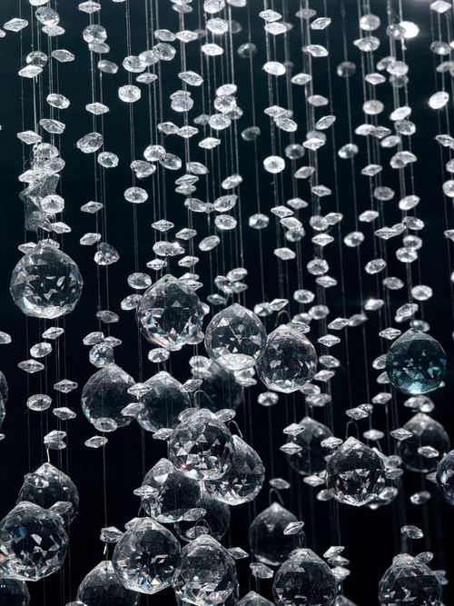 Free A dazzling display of hanging crystal beads creating a sparkling effect. Stock Photo