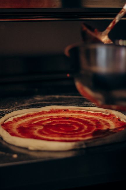 Close-up of rich marinara sauce in a bowl, ready to serve`