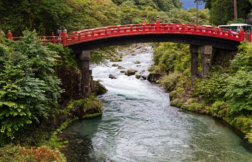 Free Beautiful Shinkyo Bridge over Daiya River in lush Nikko landscape. Stock Photo