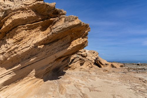 Free Stunning rock formations along the Torrevieja coast under a bright blue sky. Stock Photo
