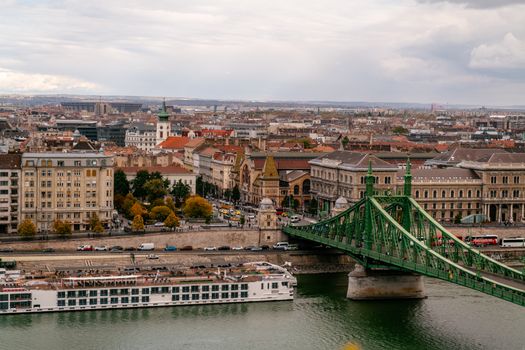 A captivating view of Budapest's Liberty Bridge with historical architecture and urban charm.