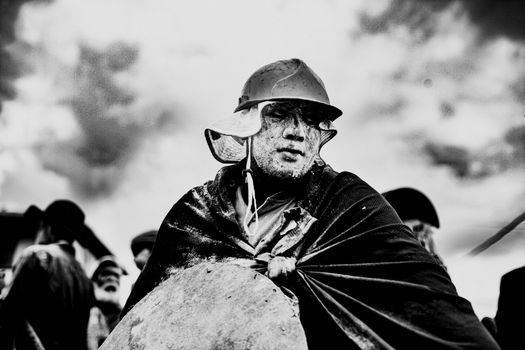 Dramatic black and white portrait of a historical reenactor in Viento Frío, Panama.