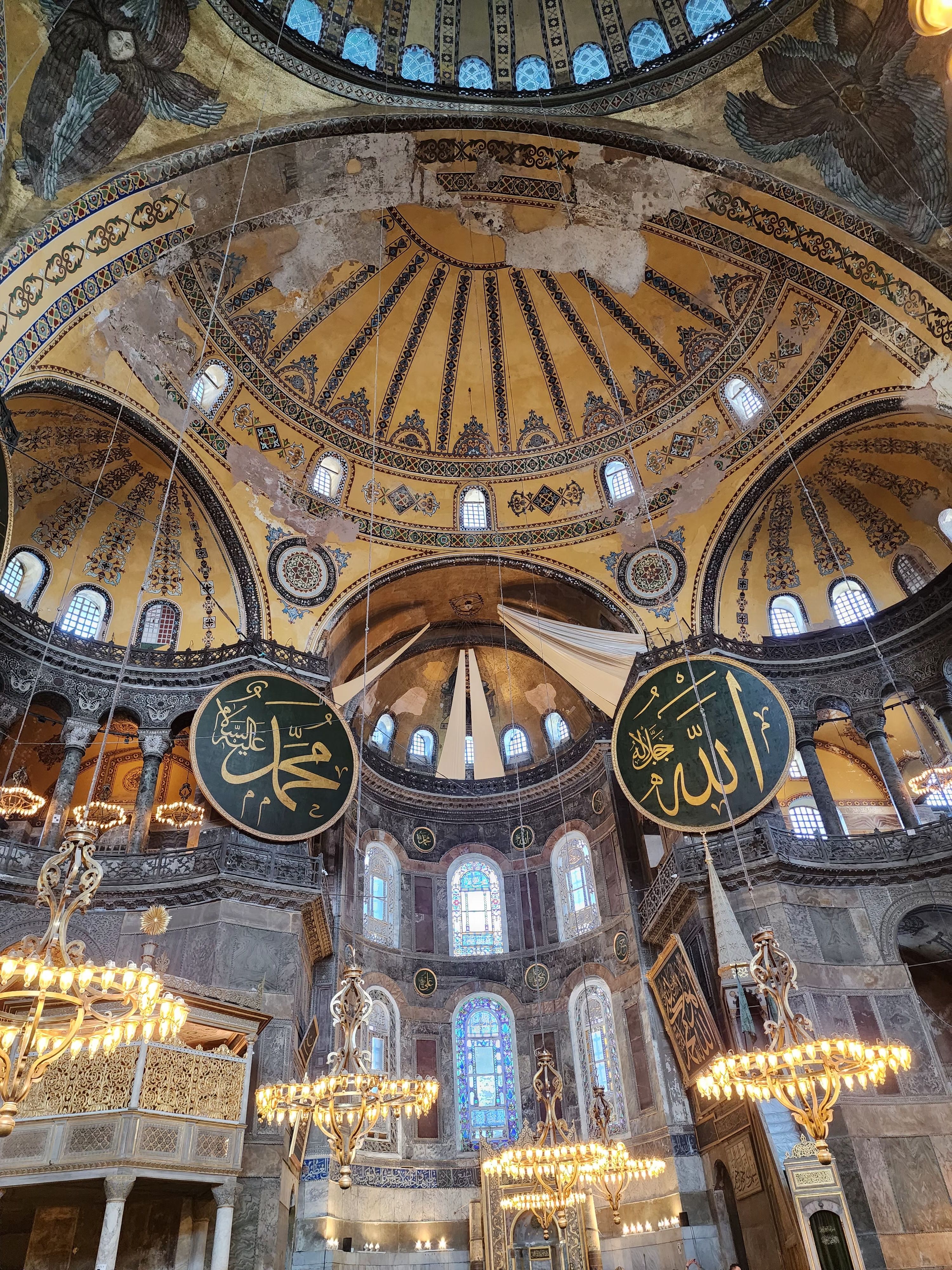 Stunning view of the iconic Hagia Sophia's grand interior and ornate dome.