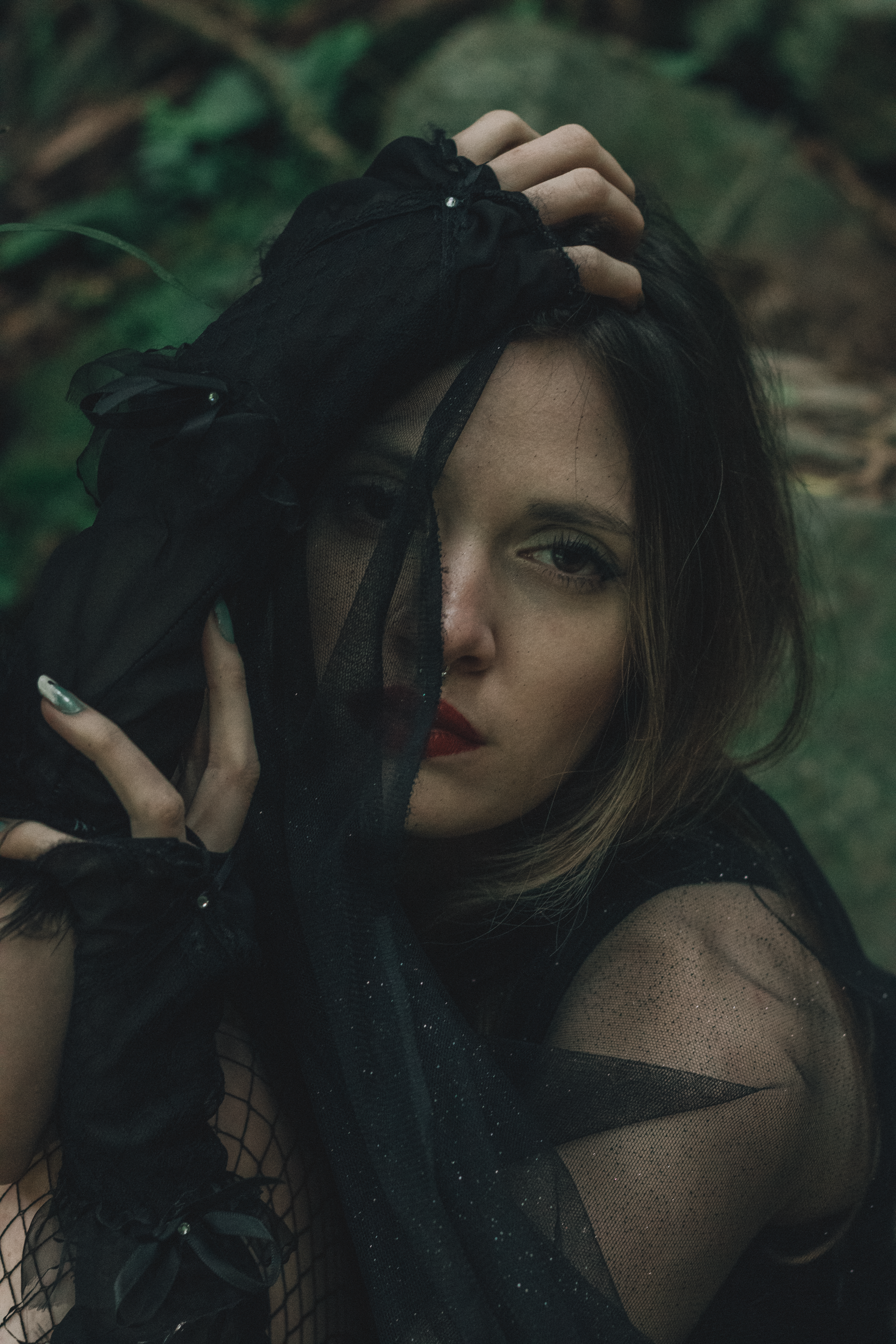 Dramatic Portrait of Woman in Black Veil Outdoors · Free Stock Photo