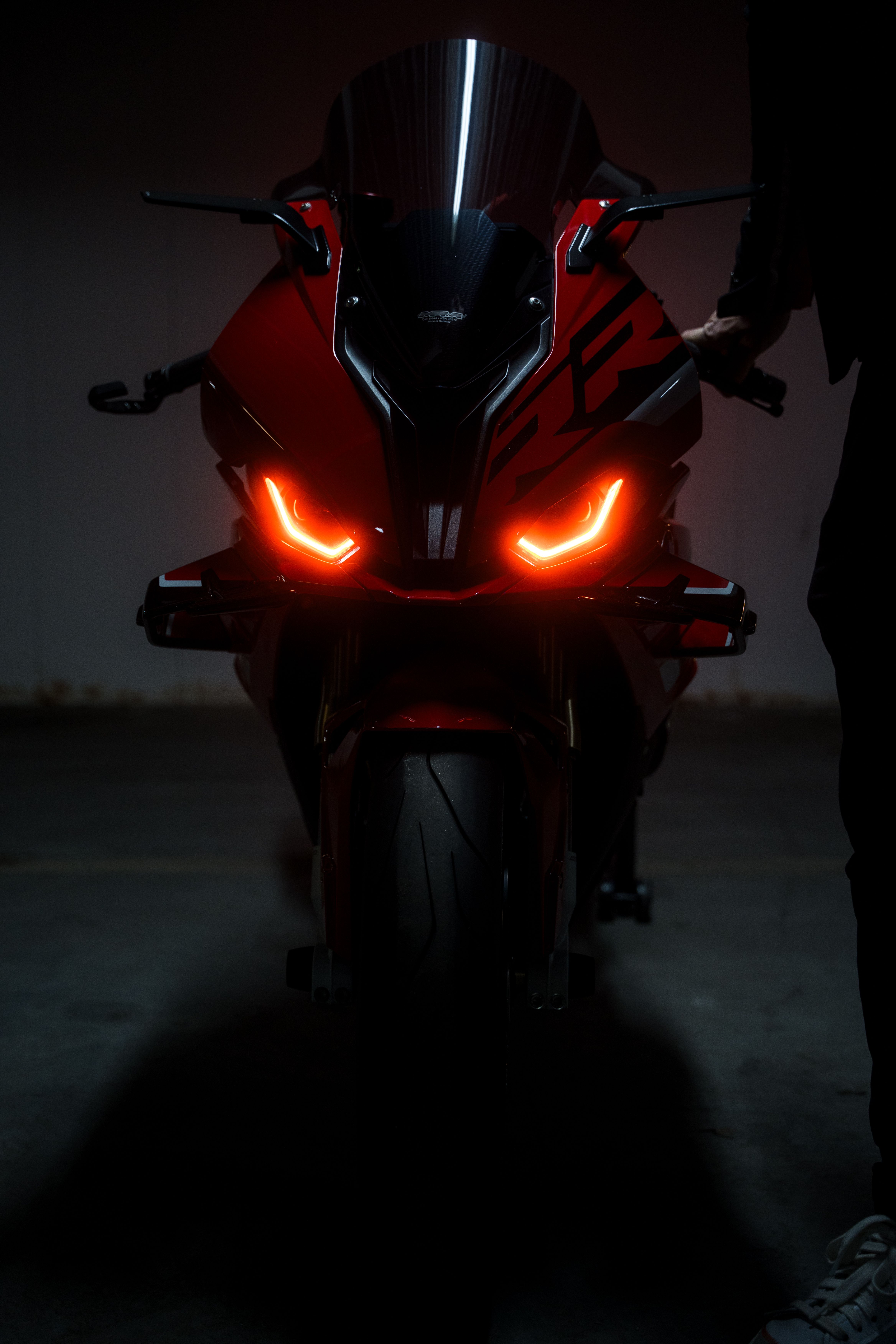 Front View of a Red Sport Motorcycle with LED Lights · Free Stock Photo