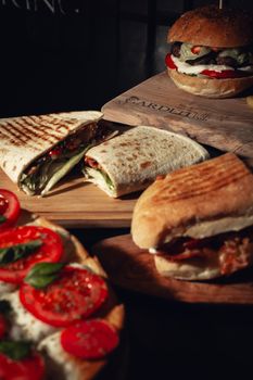 A tempting assortment of gourmet sandwiches with fresh ingredients, perfect for a casual meal.