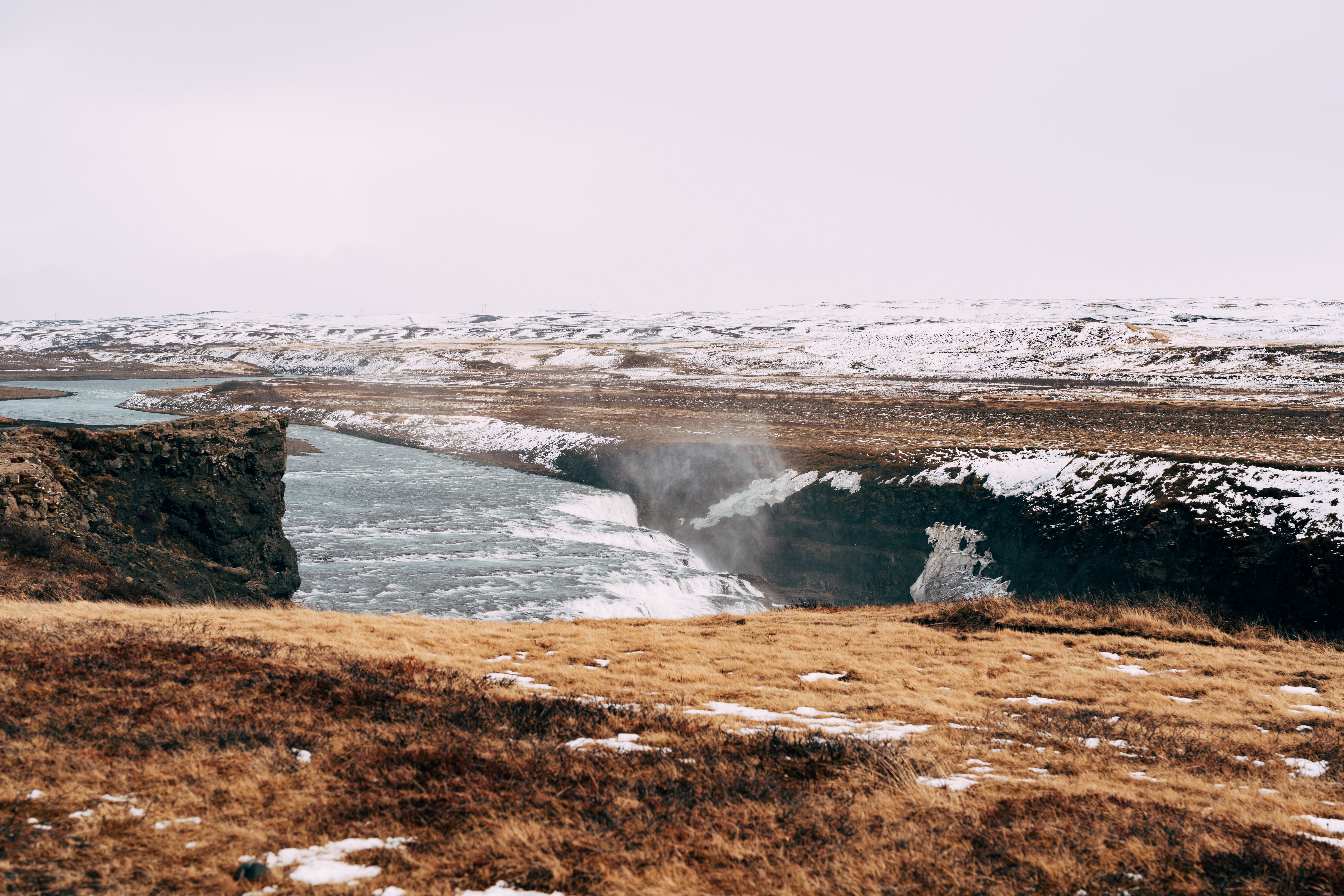 Majestic Icelandic Waterfall in Winter Landscape · Free Stock Photo
