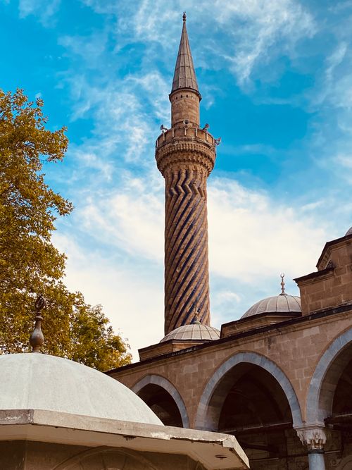 Free The iconic spiral minaret of the Selimiye Mosque against a bright blue sky. Stock Photo