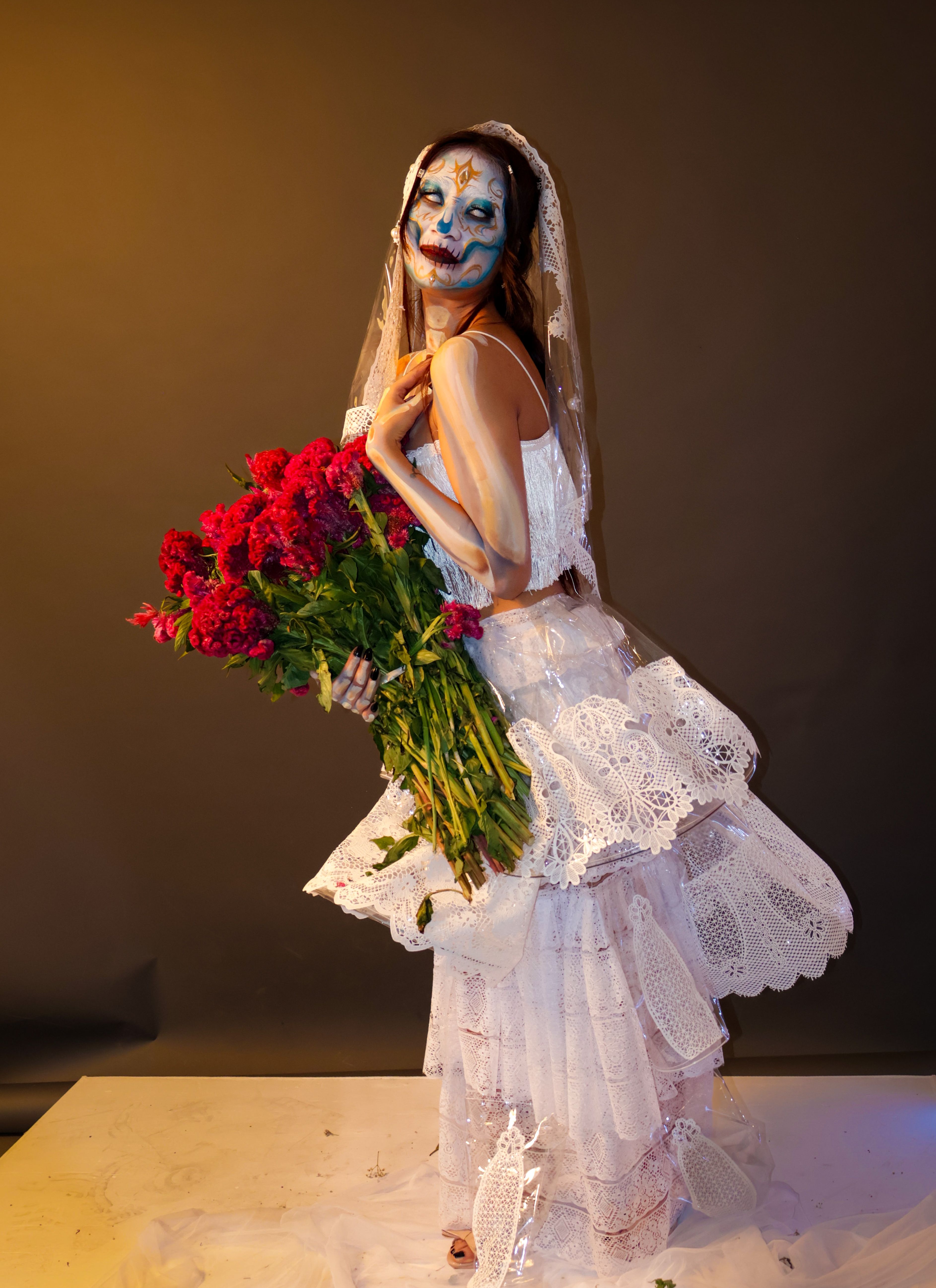 Dia de los Muertos Bride with Floral Bouquet · Free Stock Photo