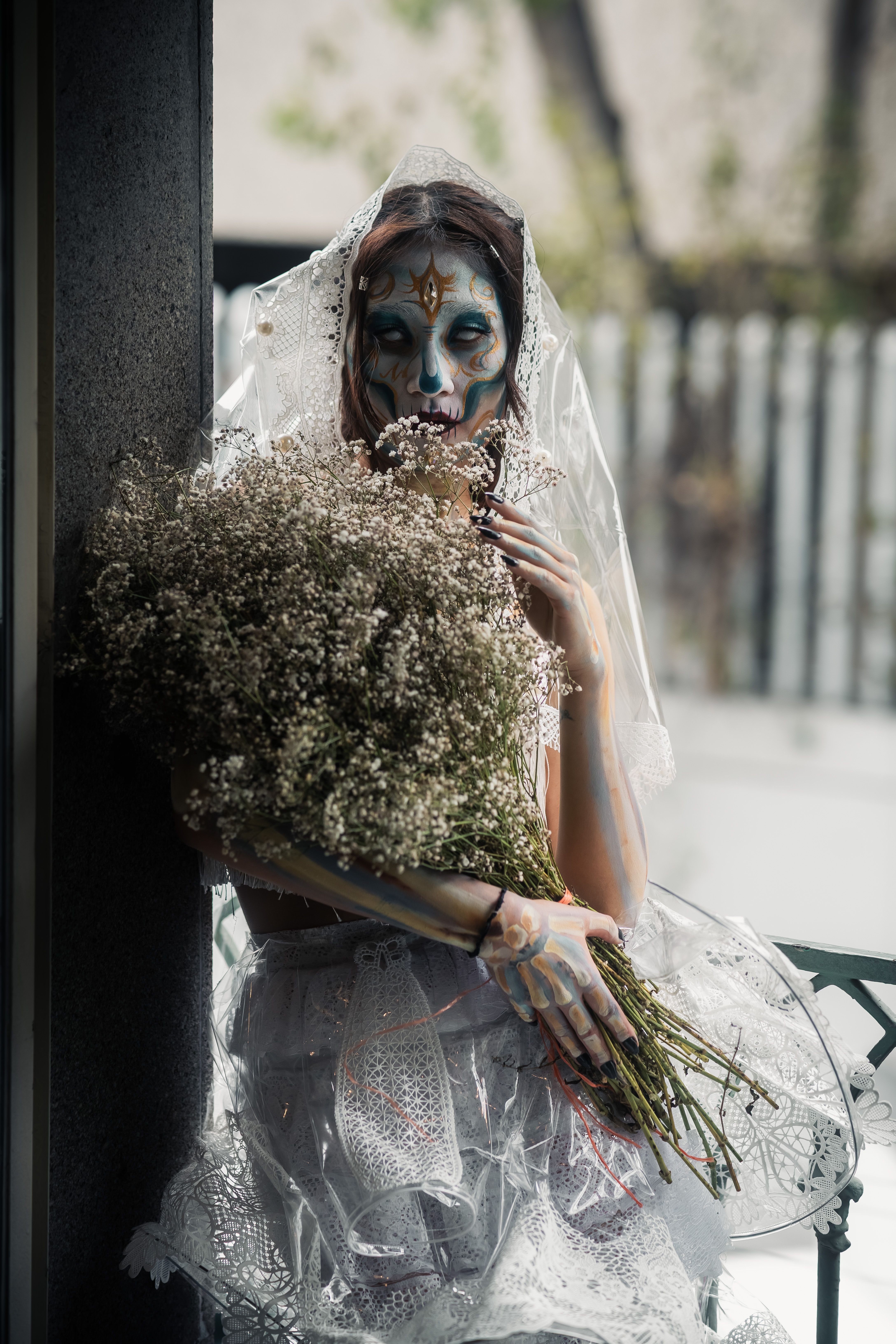 Day of the Dead Bride with Floral Bouquet · Free Stock Photo