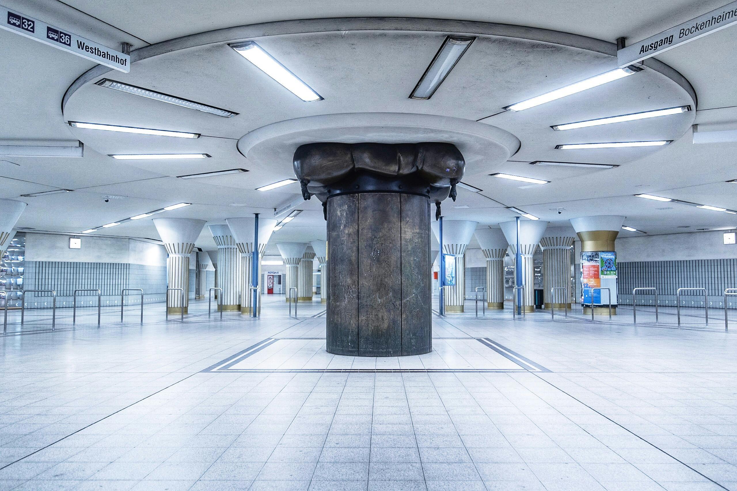 Explore the striking design of Frankfurt's Bockenheimer Warte metro station, featuring unique architectural elements.