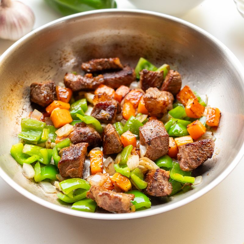 Philly Cheesesteak Beef Burgers with Sautéed Peppers