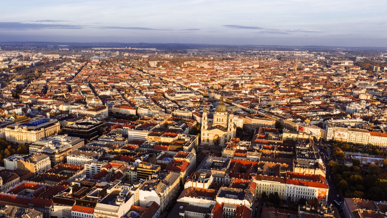 Aerial view of Budapest historic architecture under blue sky