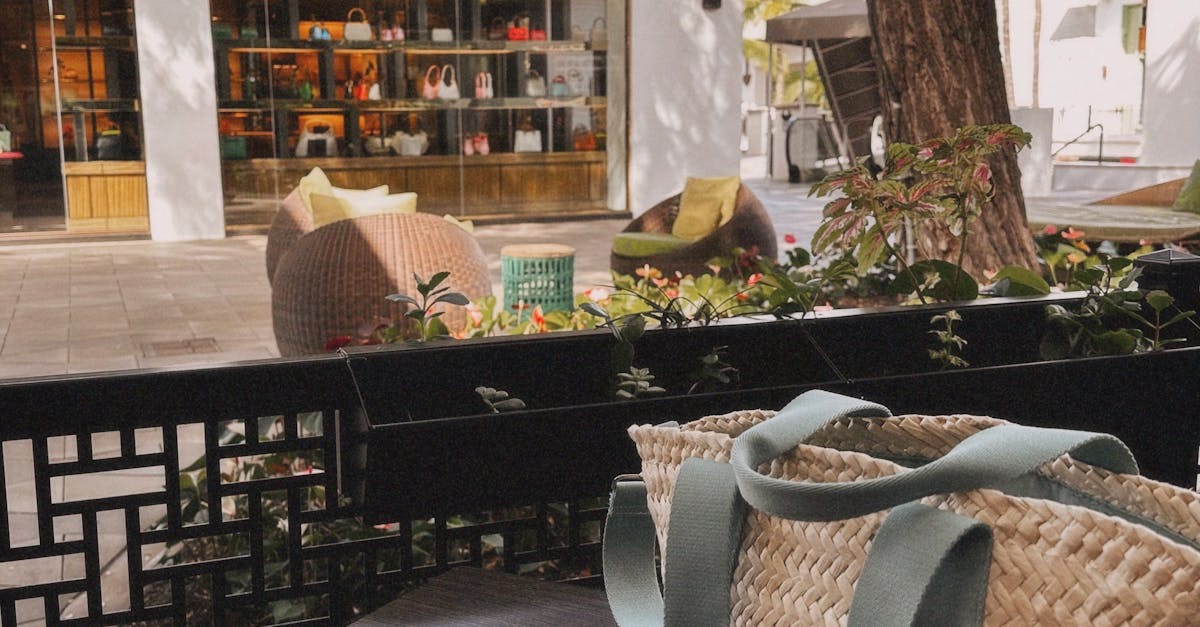 Photo by Mariya E. Stylish outdoor cafe scene with Gucci store in view. Relaxed urban vibe.