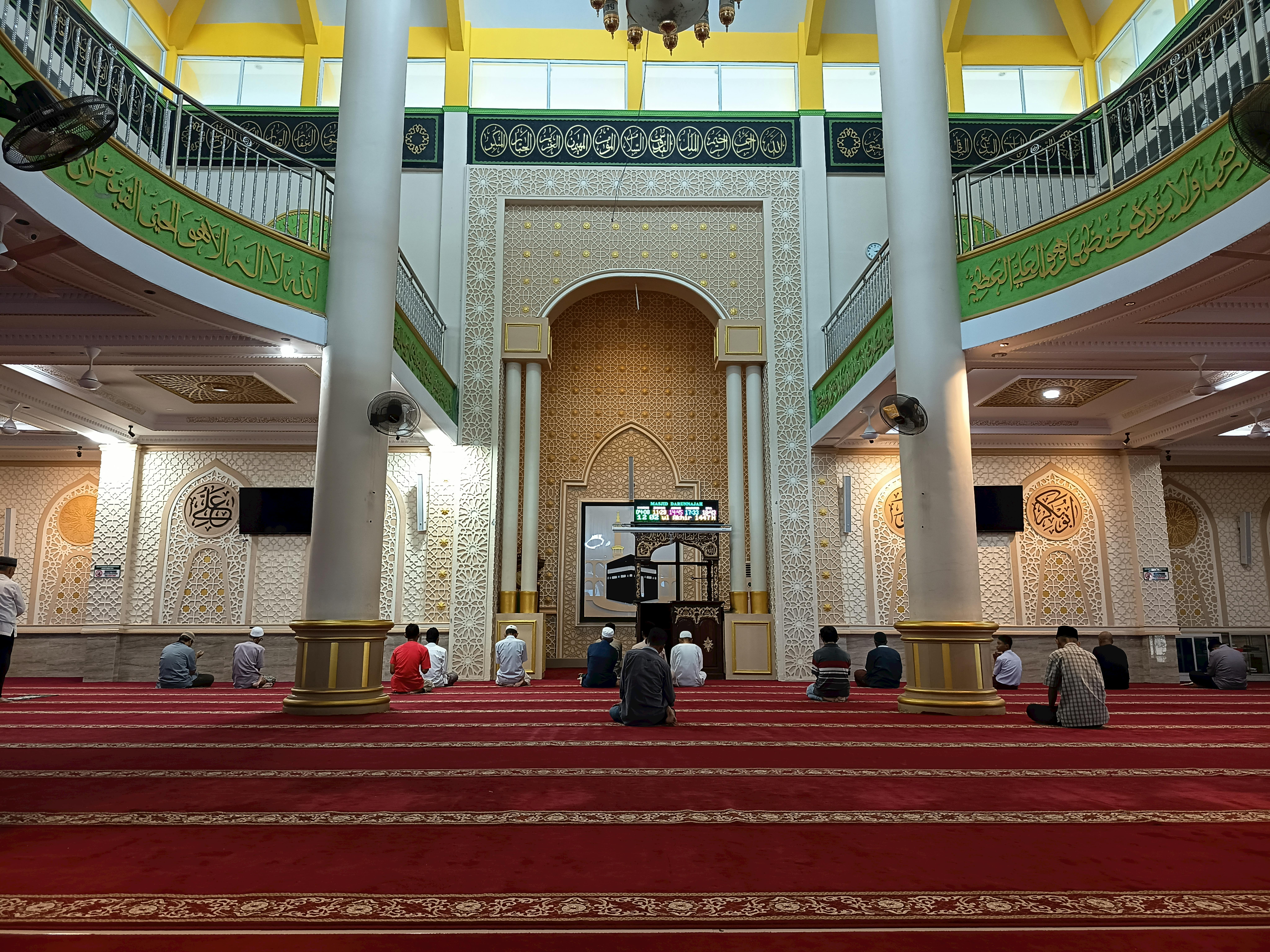 Captivating view of people praying inside a mosque in West Kalimantan, Indonesia.