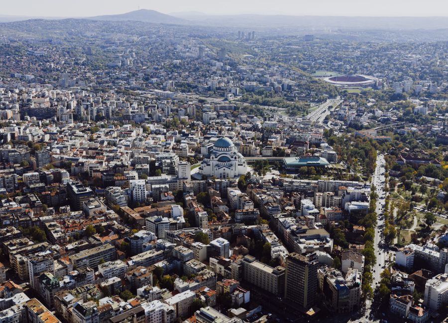 Aerial shot of Belgrade cityscape featuring the iconic St. Sava Temple, Serbia.