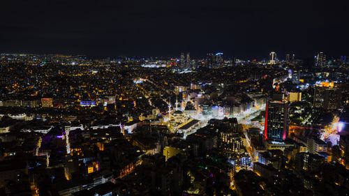 Free Stunning aerial view of Istanbul at night with city lights illuminating the urban landscape. Stock Photo