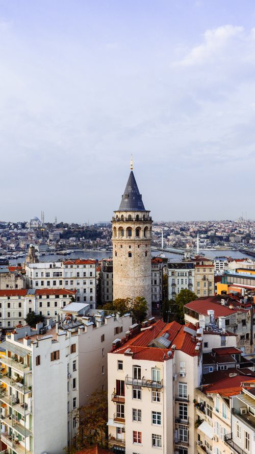 Free Stunning aerial view of Galata Tower and Istanbul's cityscape under a clear sky. Stock Photo