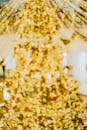 Blurred Christmas Tree with Golden Bokeh Lights