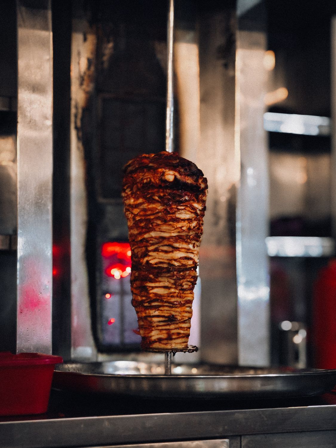 Juicy Doner Kebab Rotating on Vertical Grill · Free Stock Photo