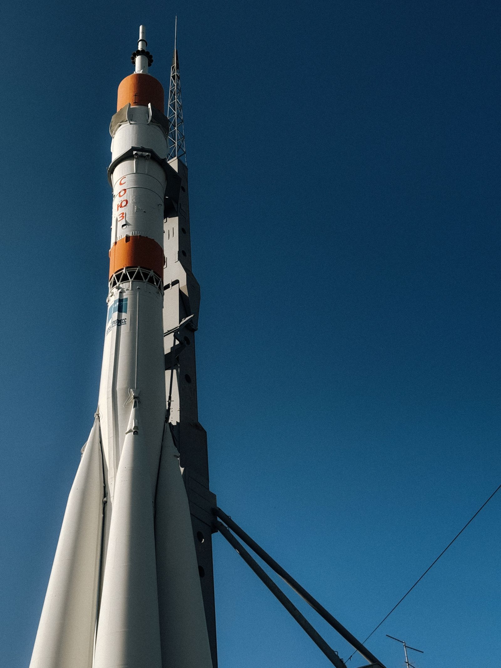 Rocket against a clear blue sky, representing defence and aerospace