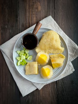 Delicious savory tapioca dish with cucumbers and sauce, perfect for a healthy breakfast.