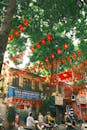 Vibrant Street Scene with Vietnamese Flags and Bicycles