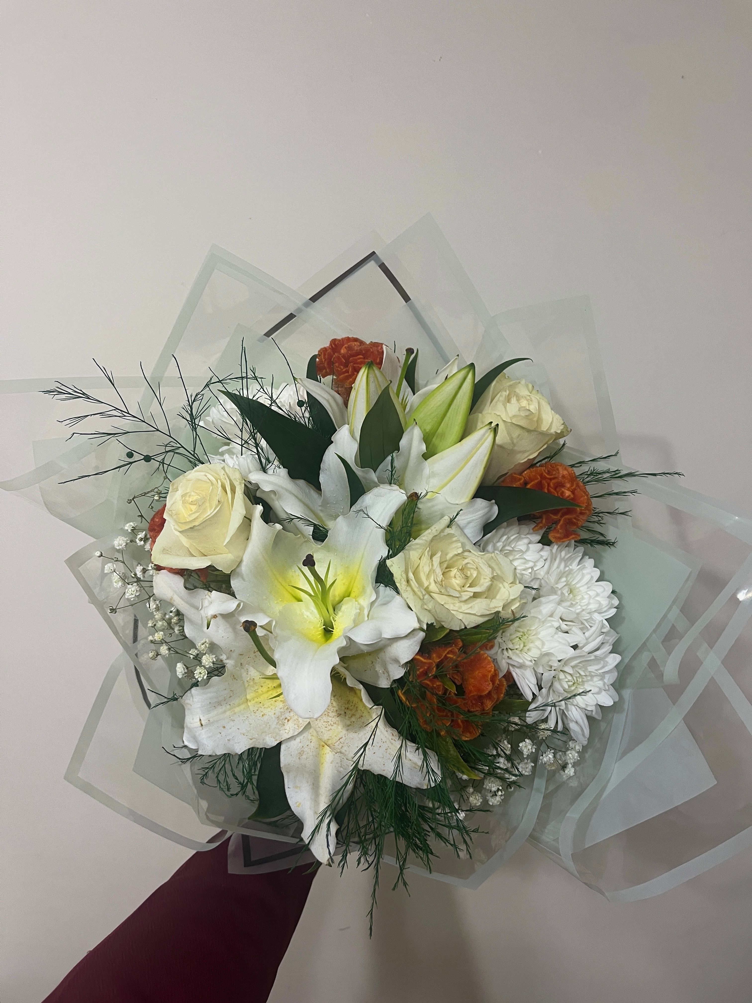 [ColoSach]-beautiful-flower-bouquet-featuring-white-lilies,-roses,-and-orange-carnations-with-exquisite-details.