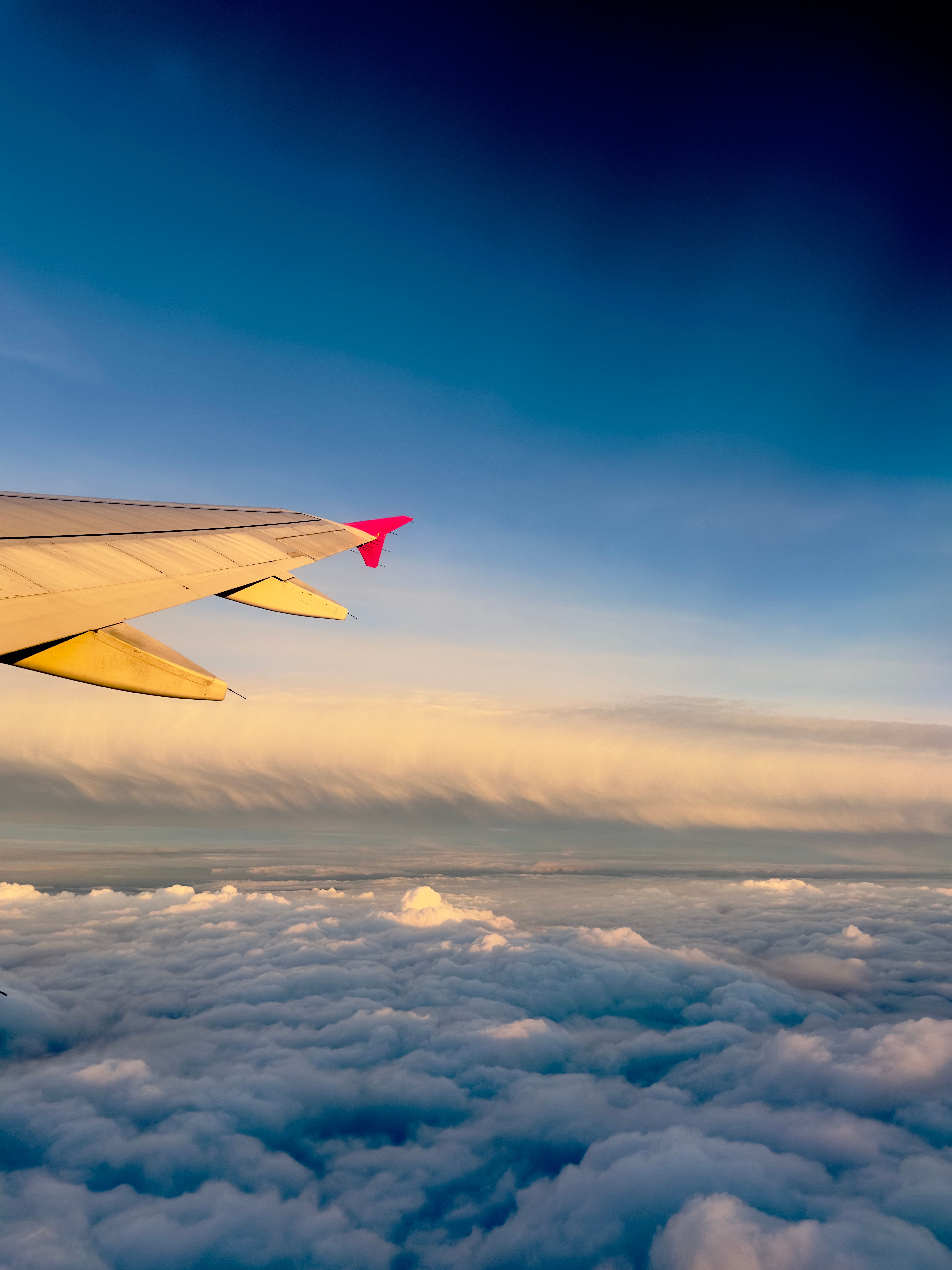 Scenic Airplane Wing View at Sunrise · Free Stock Photo