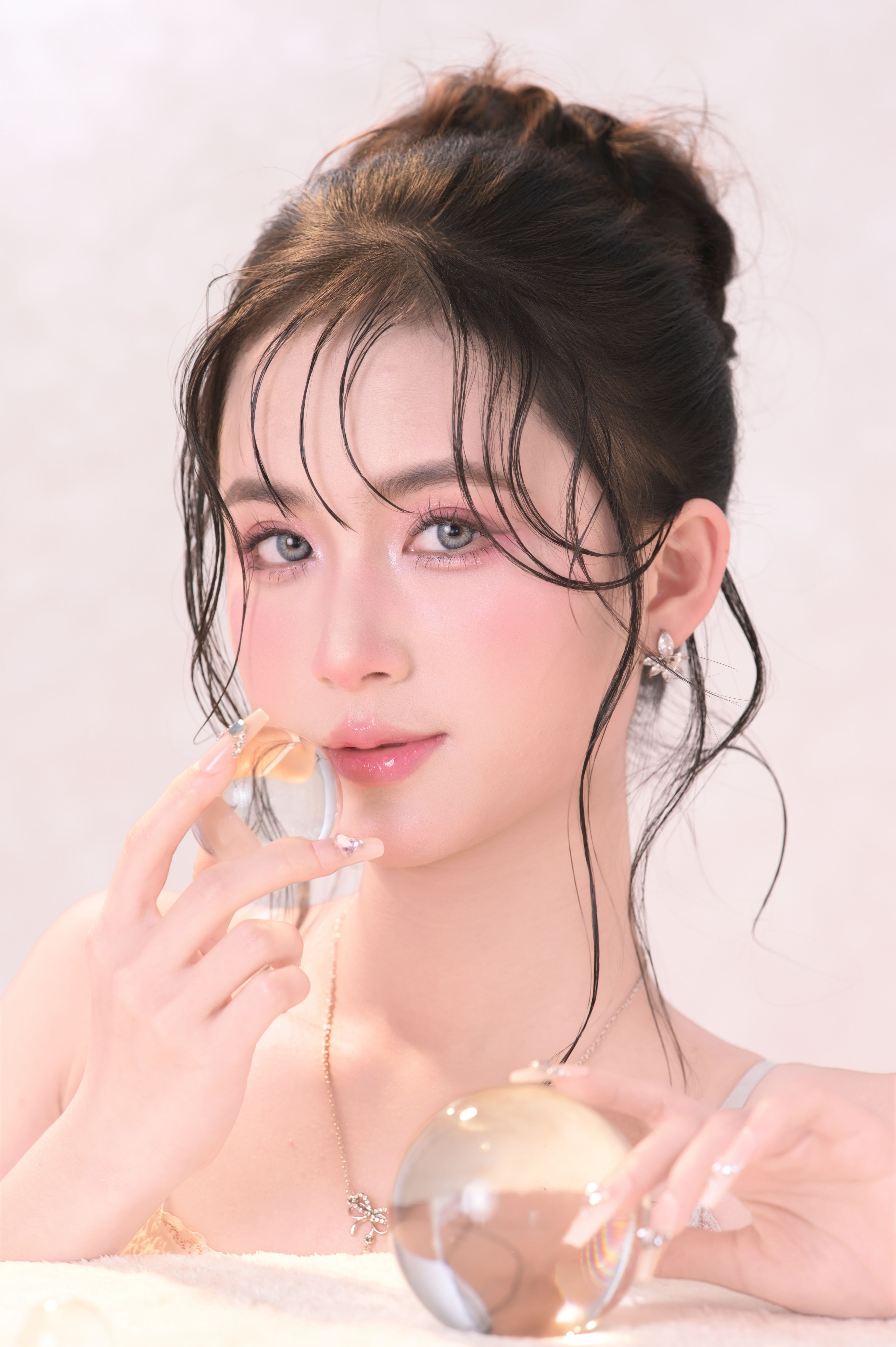 Elegant Portrait of a Woman with Crystal Ball · Free Stock Photo