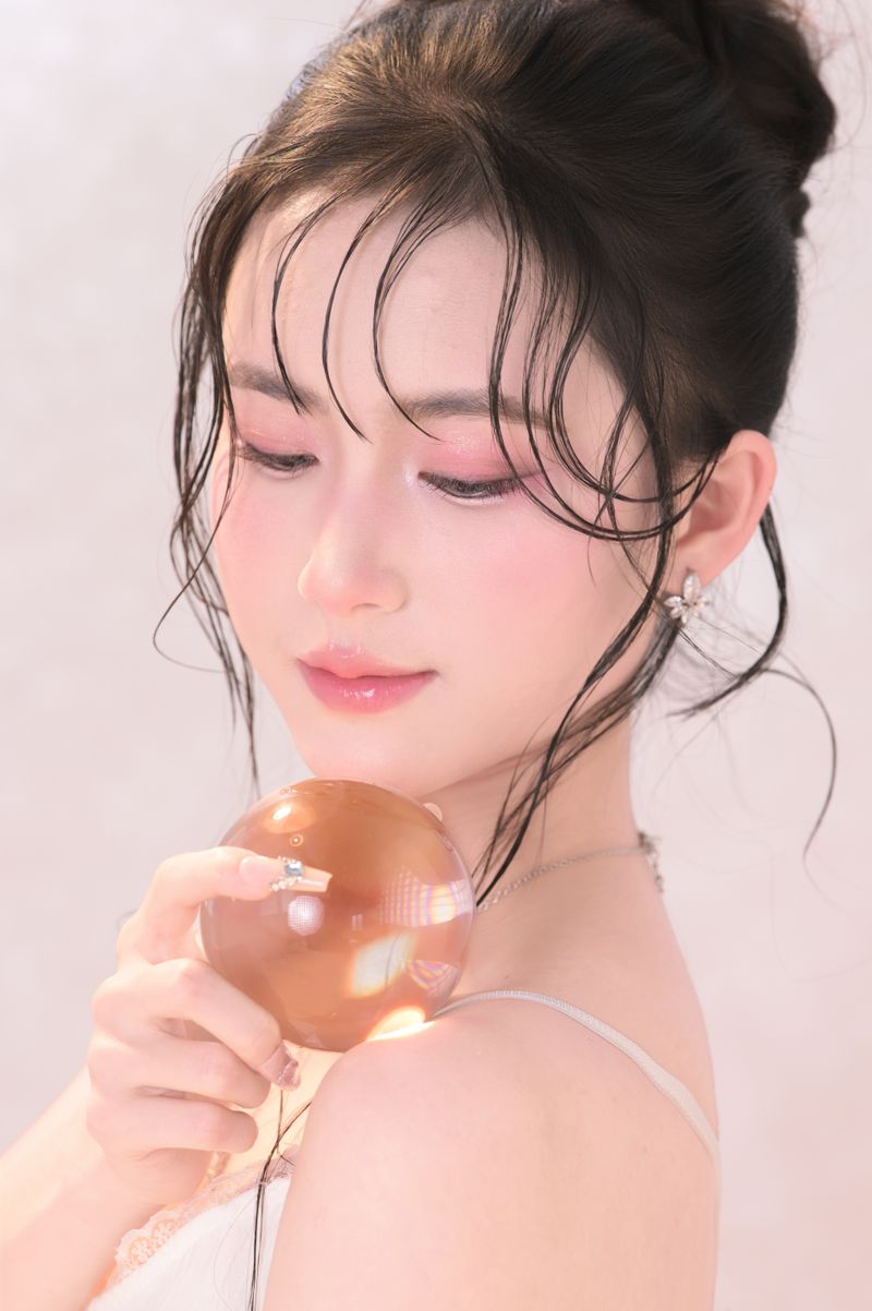 Dewy Korean beauty portrait with soft pink makeup