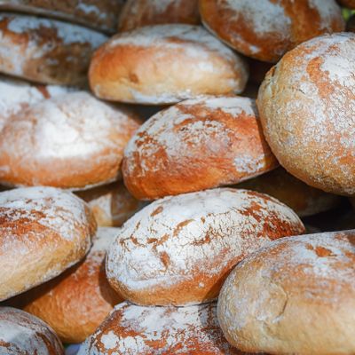 Baker's hands shaping dough