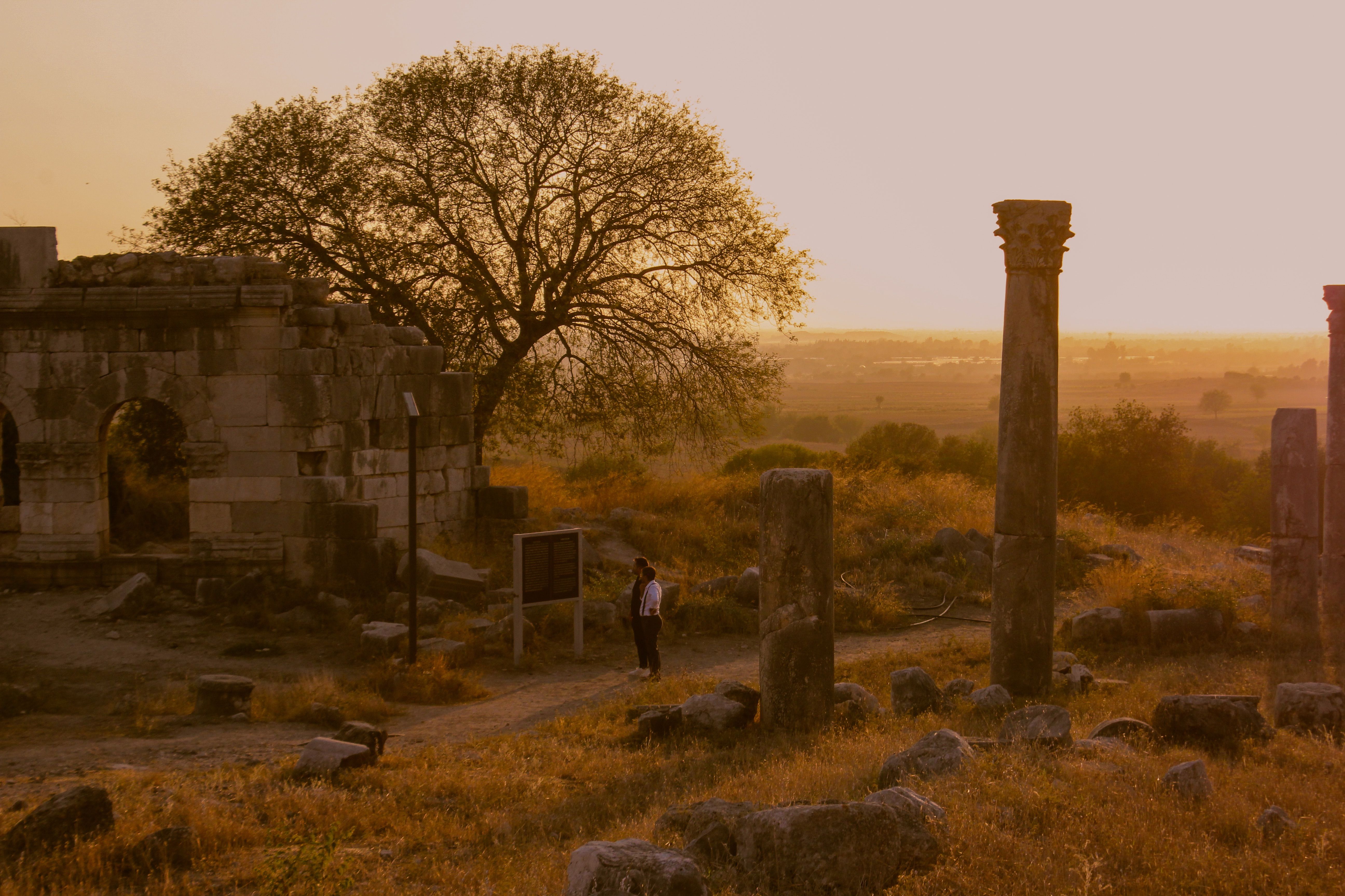 Ancient Ruins at Sunset in Archaeological Site · Free Stock Photo