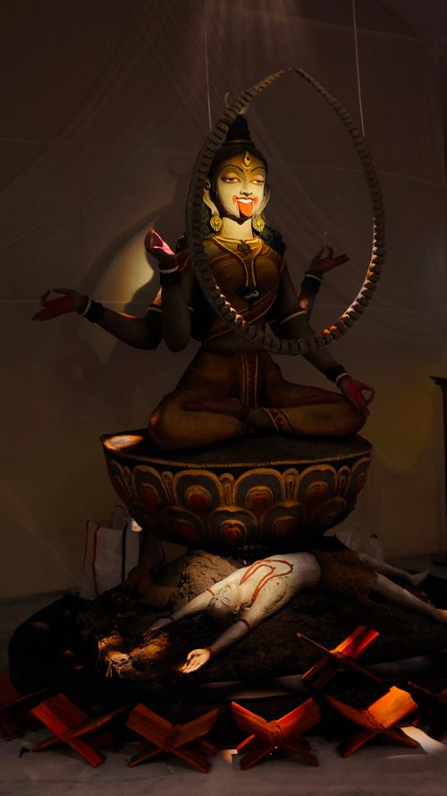 Free A detailed sculpture of a Hindu goddess surrounded by symbolic elements, capturing cultural heritage. Stock Photo
