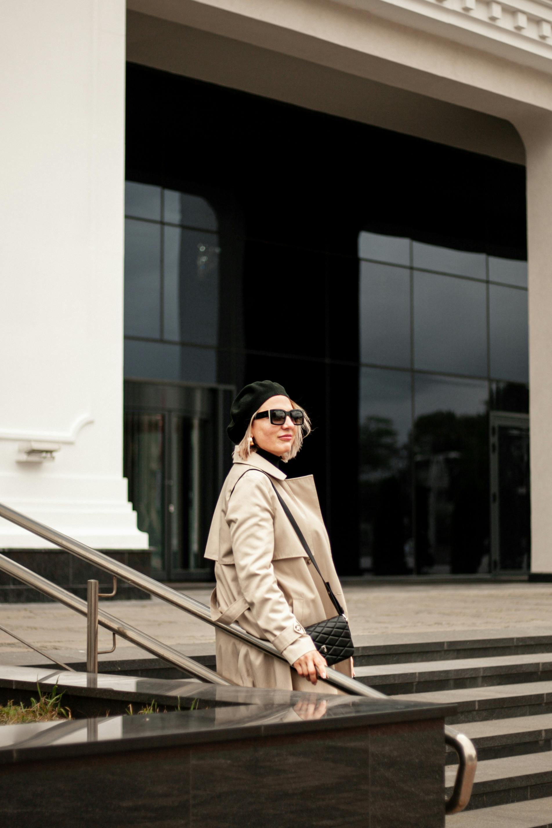 Stylish woman in trench coat autumn fashion