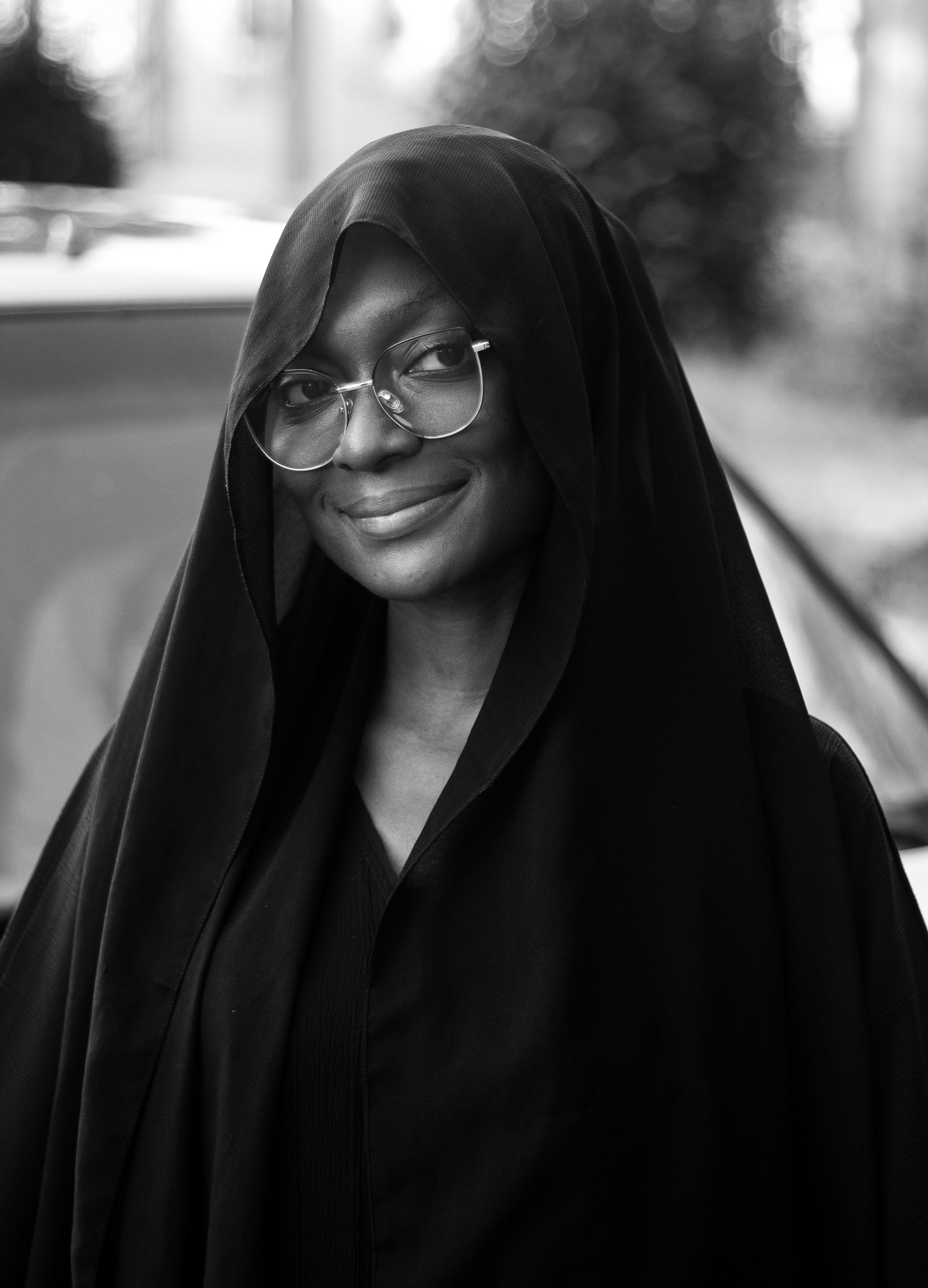 Portrait of a Smiling Woman in Hijab Outdoors · Free Stock Photo