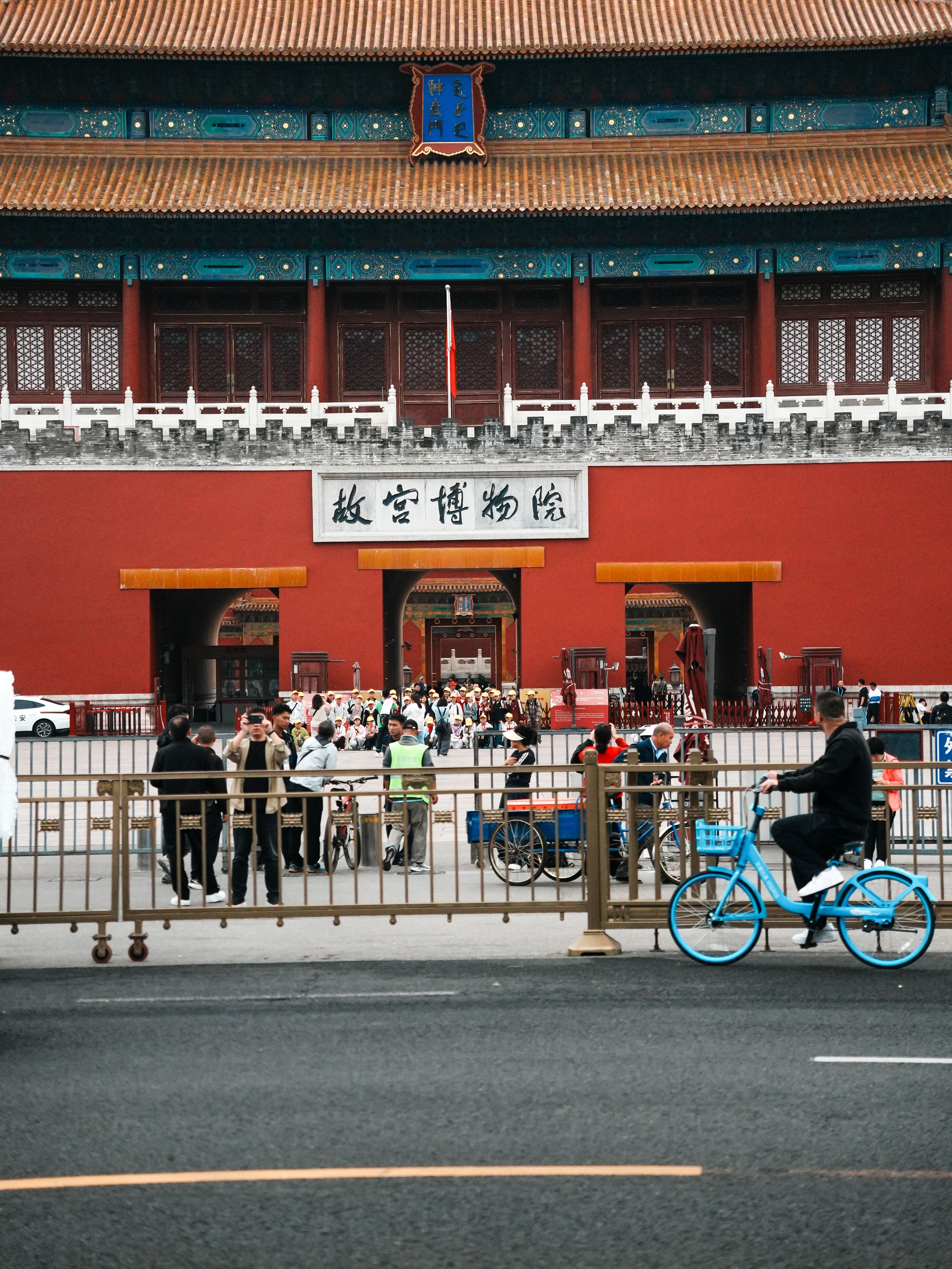 Crowds gather at the entrance of the Forbidden City, Beijing, showcasing its iconic architecture.