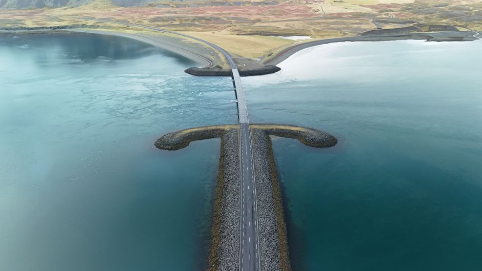 Ultimate Glacier Edge Helicopter Tour with Landing from Skaftafell Review Review 2026 - Breathtaking aerial image of a scenic causeway spanning tranquil waters in Iceland, highlighting natural beauty.