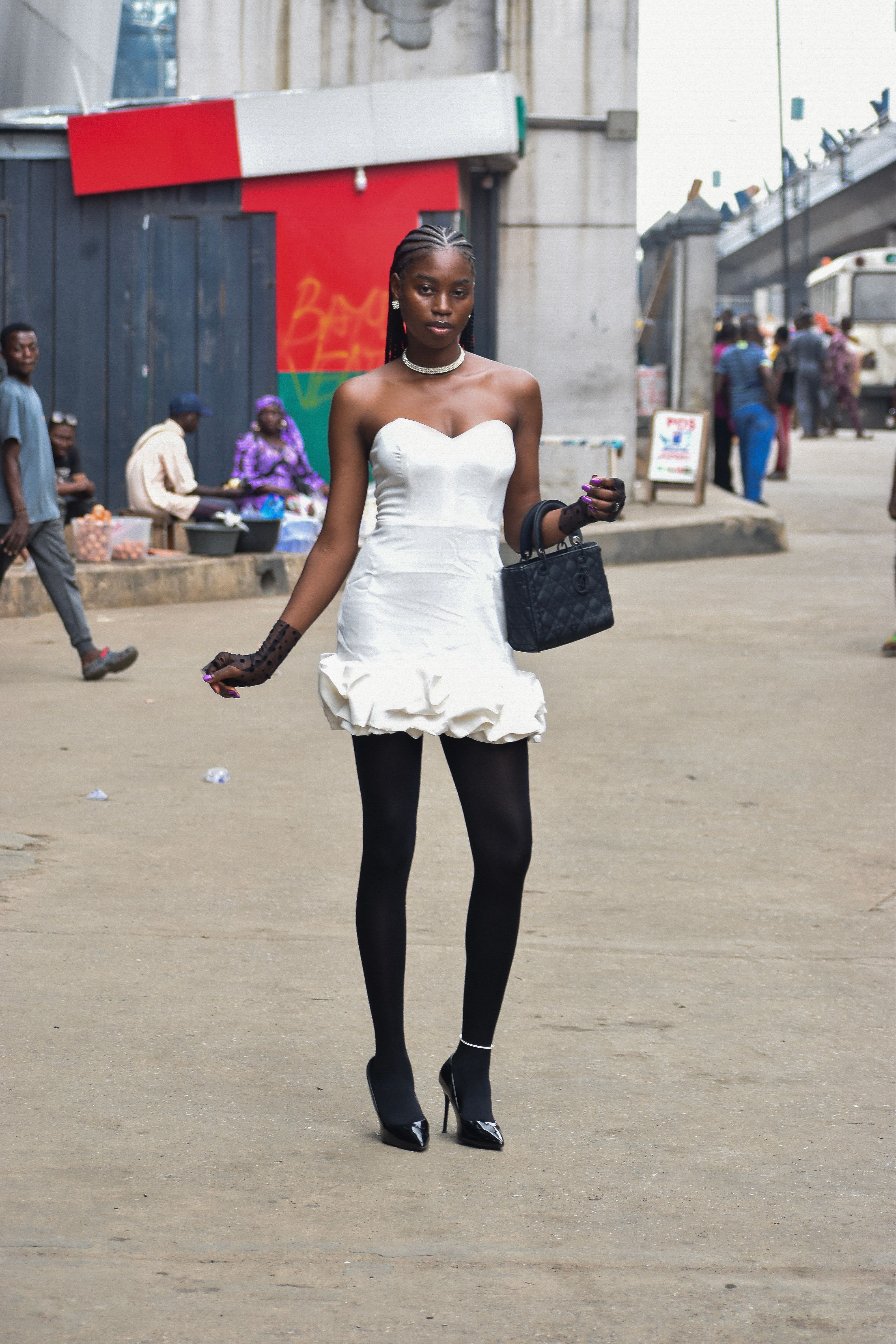 Stylish Woman in Urban Street Setting · Free Stock Photo
