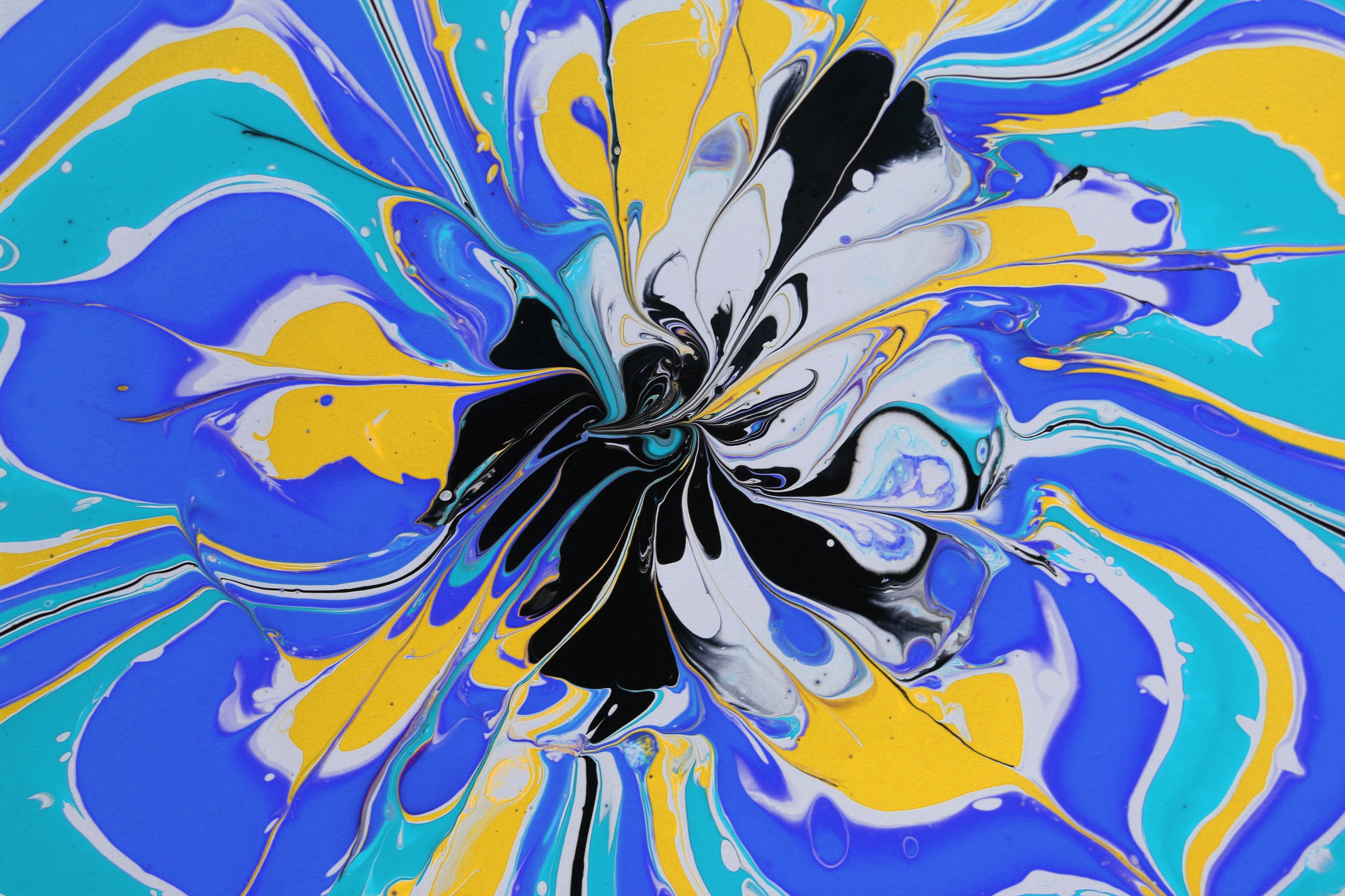Vibrant Abstract Paint Swirl in Blue and Yellow · Free Stock Photo