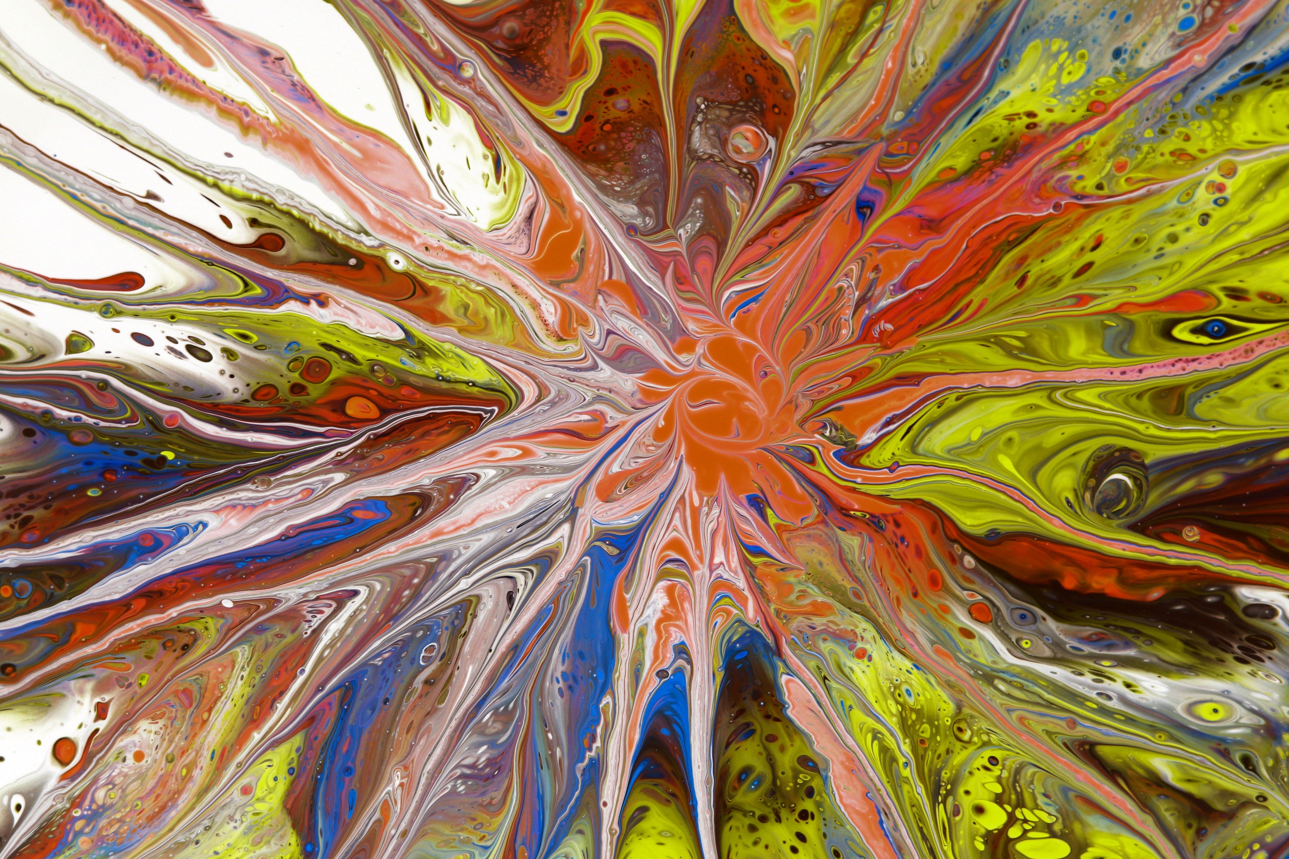 Vibrant abstract paint swirl artwork showcasing dynamic colors and patterns.