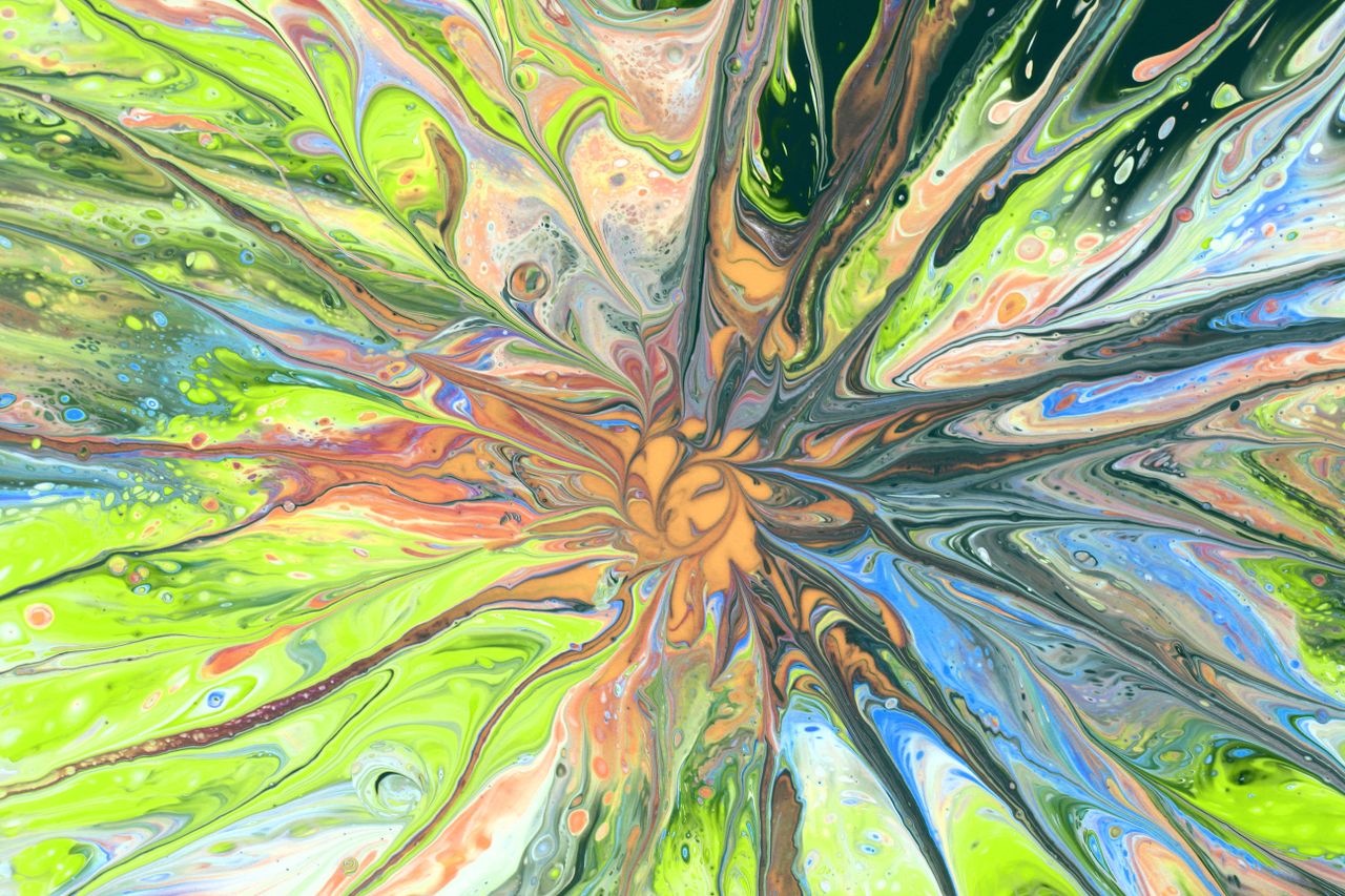 dynamic abstract art featuring vibrant swirling colors creating a hypn