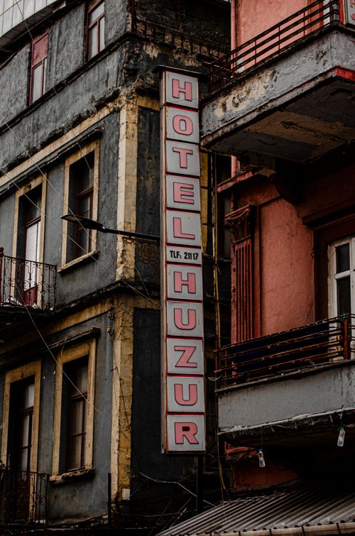 Free Explore the rustic charm of Hotel Huzur's exterior in Trabzon, Türkiye, showcasing old-world architecture. Stock Photo