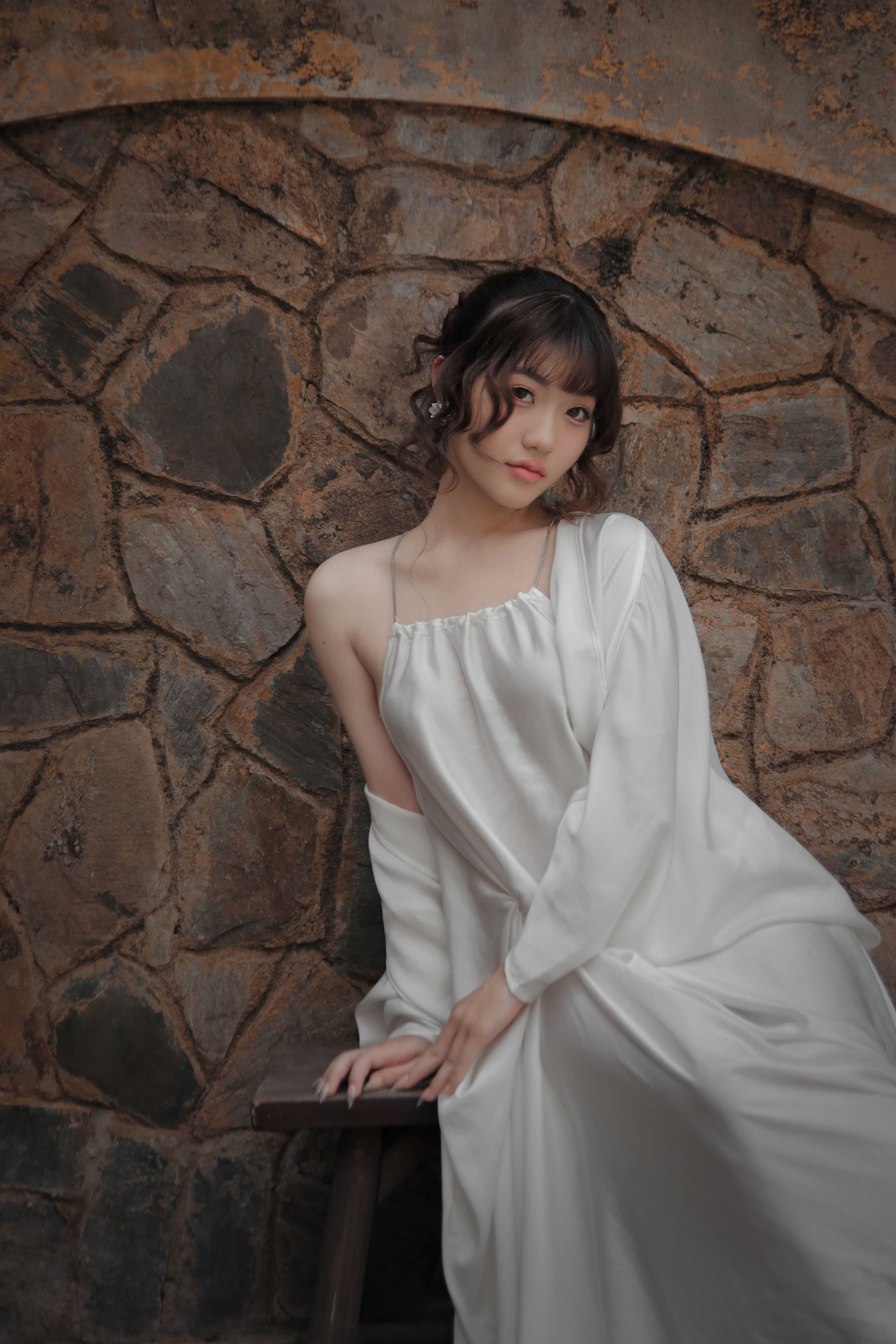 Elegant Portrait of a Woman in a White Dress · Free Stock Photo