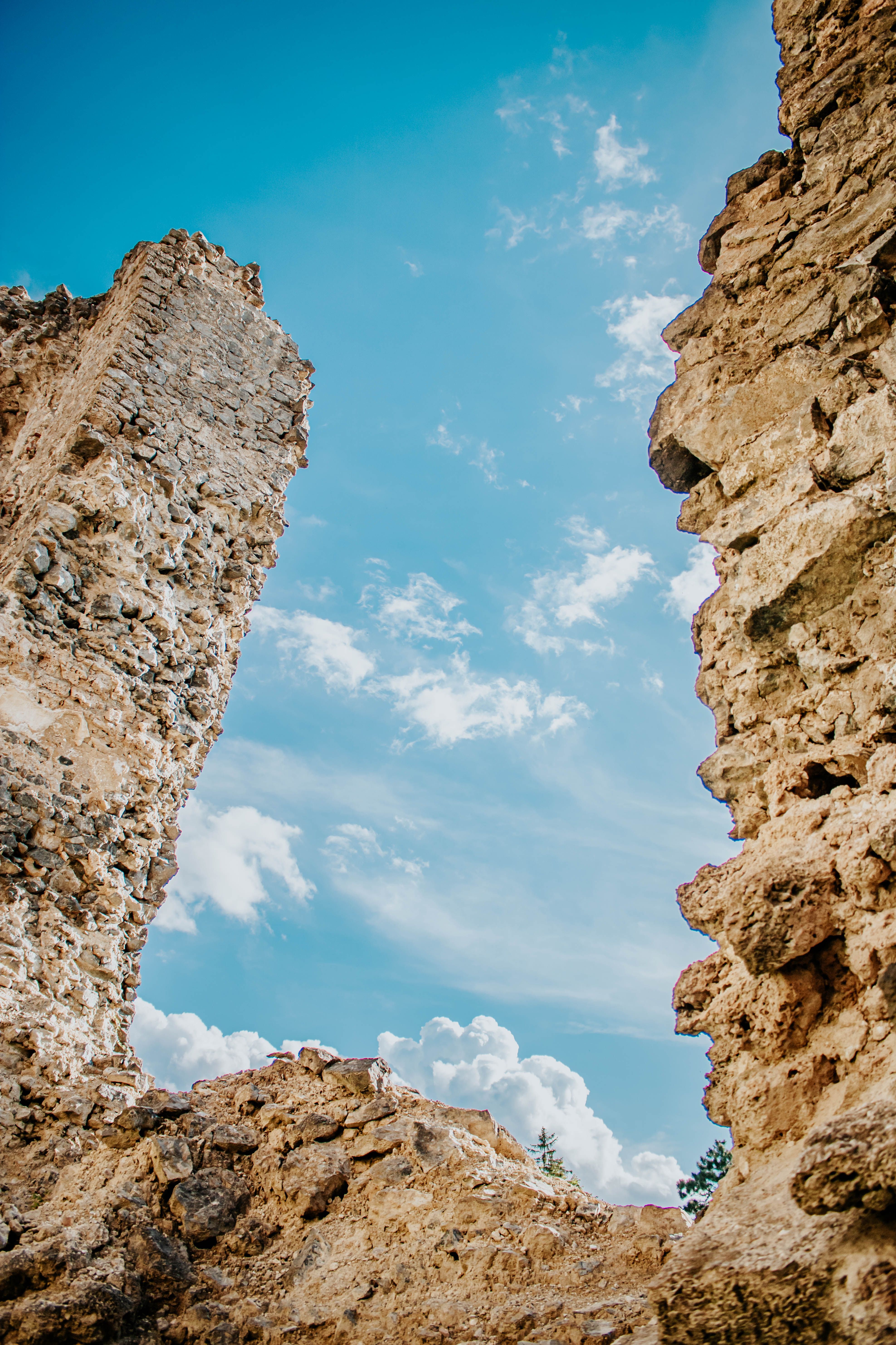 Ancient Stone Ruins Against a Clear Blue Sky · Free Stock Photo