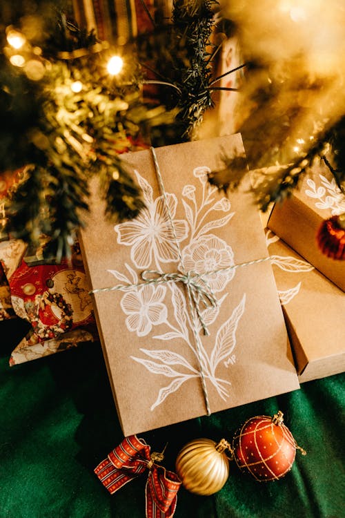 Brown Card Beside Christmas Tree
