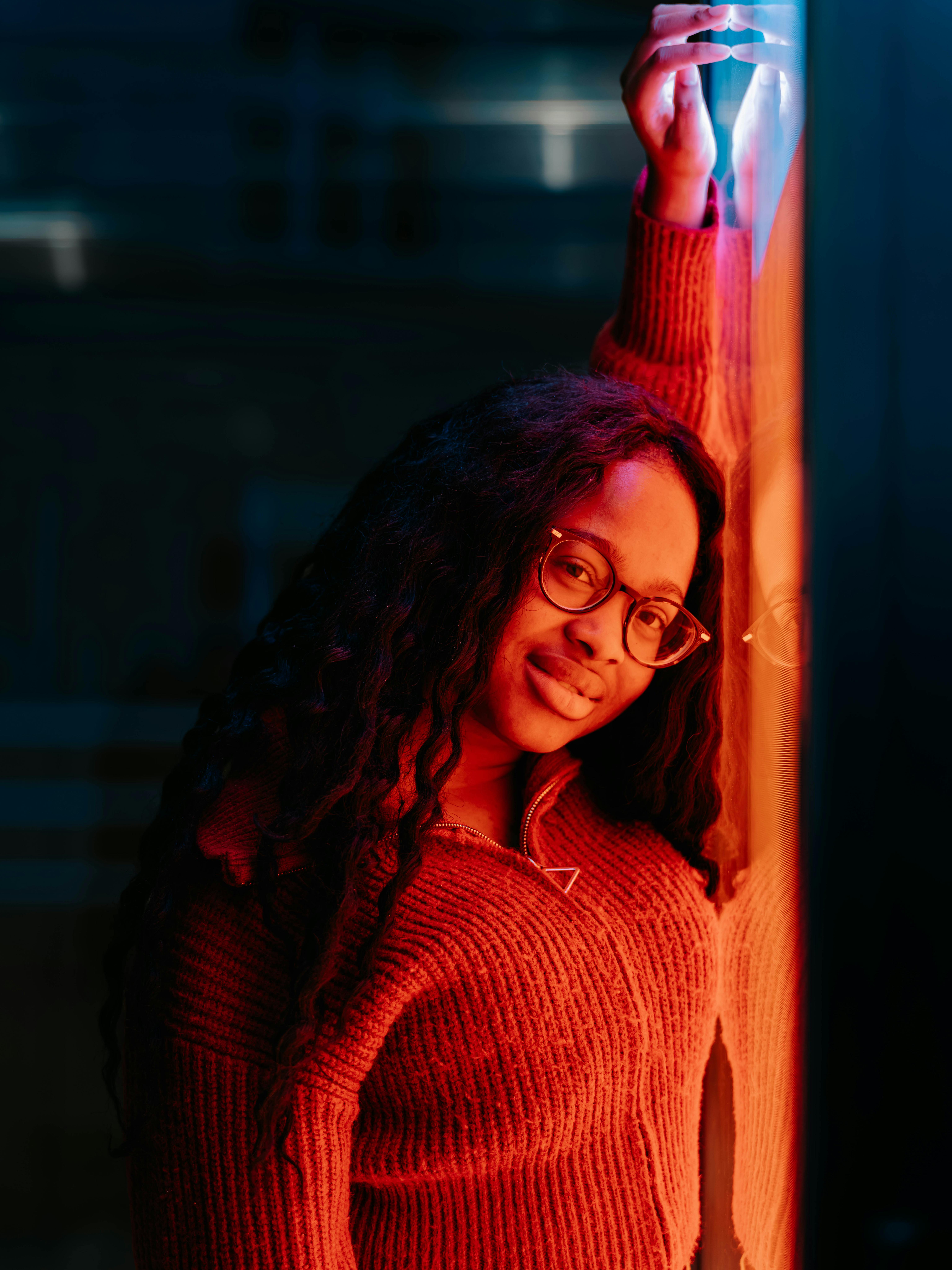 Free Portrait of a woman in Vienna with vibrant colors and artistic lighting for modern appeal. Stock Photo