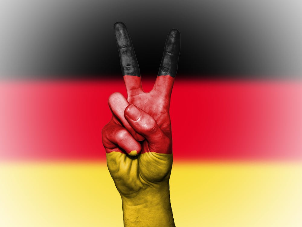 免費 德國與和平標誌的旗幟 圖庫相片