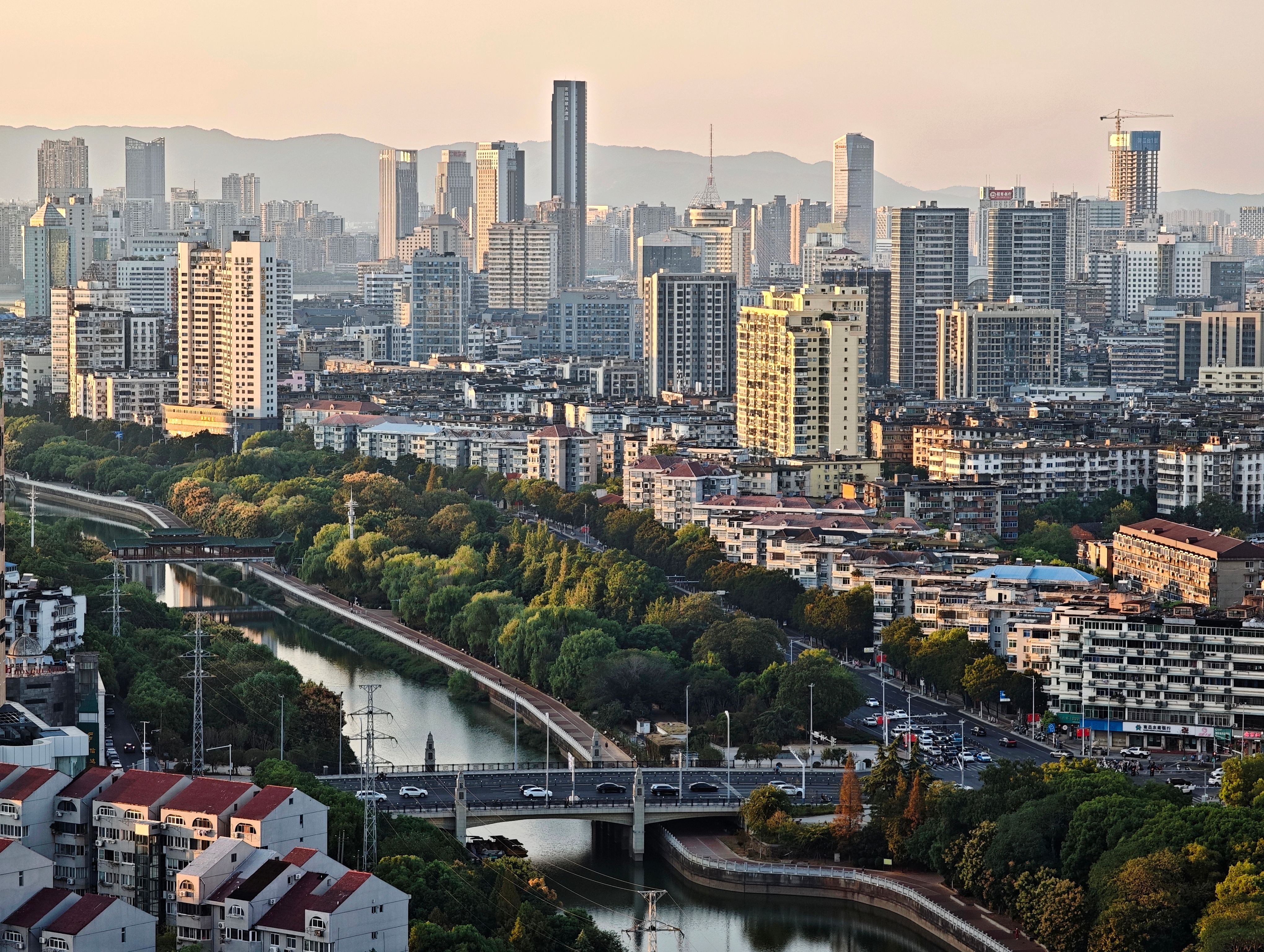 Aerial View of Modern City Skyline at Dusk · Free Stock Photo