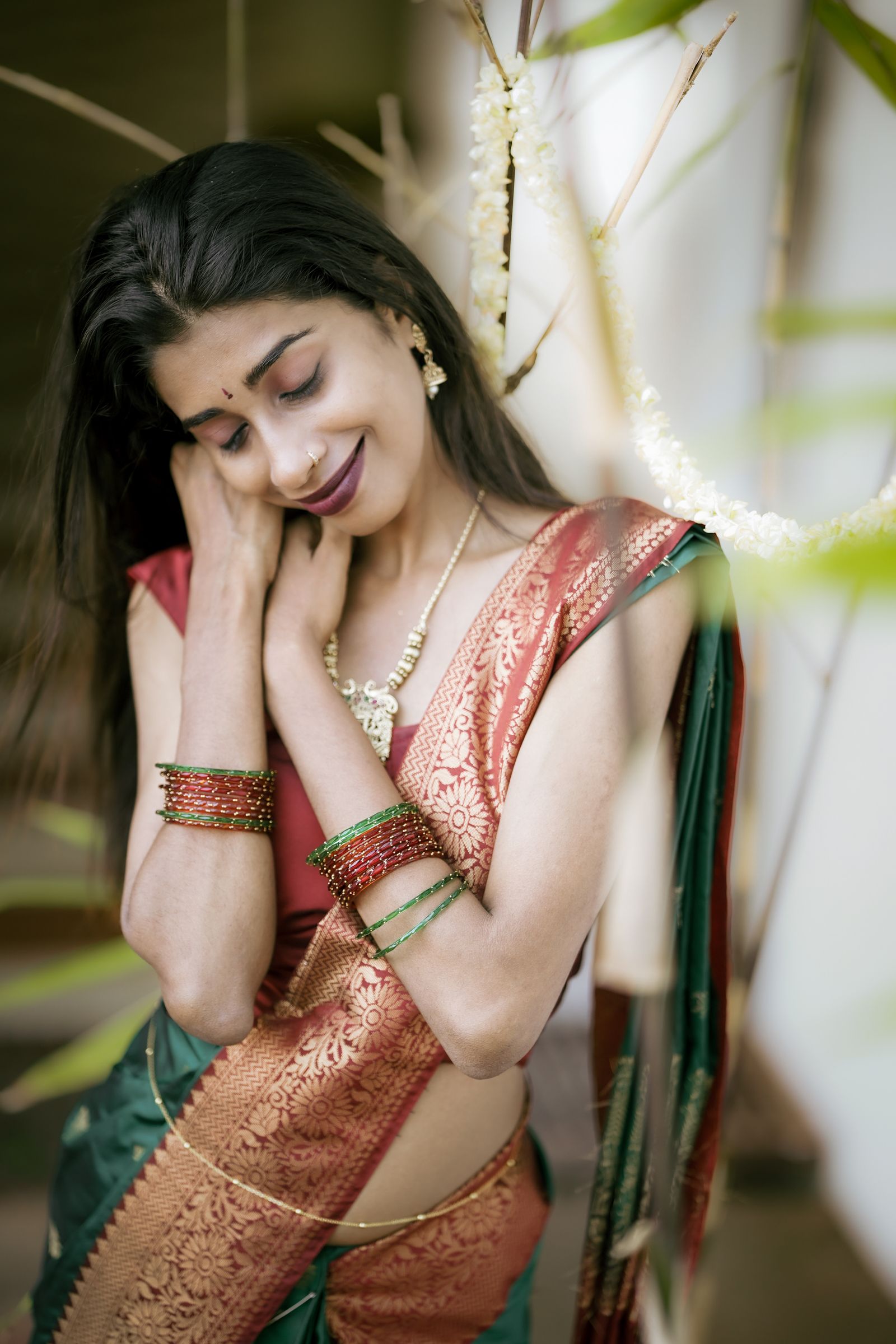 Elegant Portrait of Young Woman in Green Saree at Sunset · Free Stock Photo